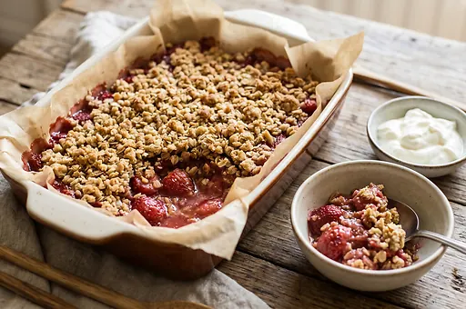 Baked strawberry crumble with oat topping